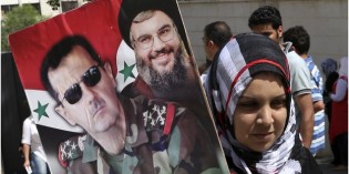 Syrians Vote Amidst Battle; Assad Poised to Be Back